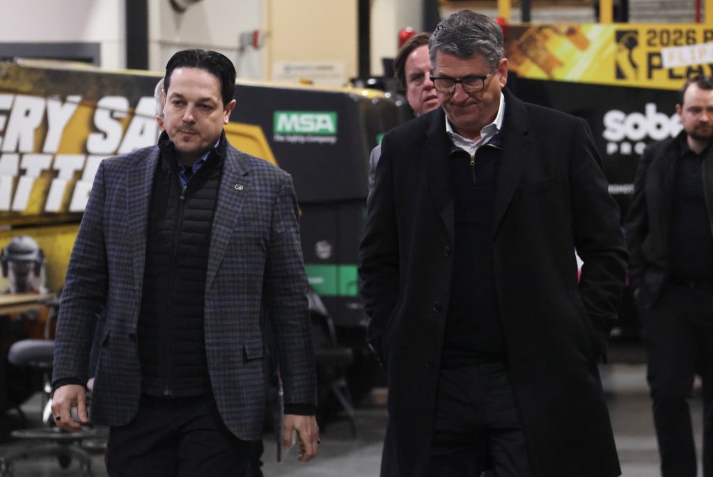 Apr 20, 2026; Pittsburgh, Pennsylvania, USA; Philadelphia Flyers General Manager Danny Briere (left) and President of Hockey Operations Keith Jones (right) after the Flyers defeated the Pittsburgh Penguins in game two of the first round of the 2026 Stanley Cup Playoffs at PPG Paints Arena.