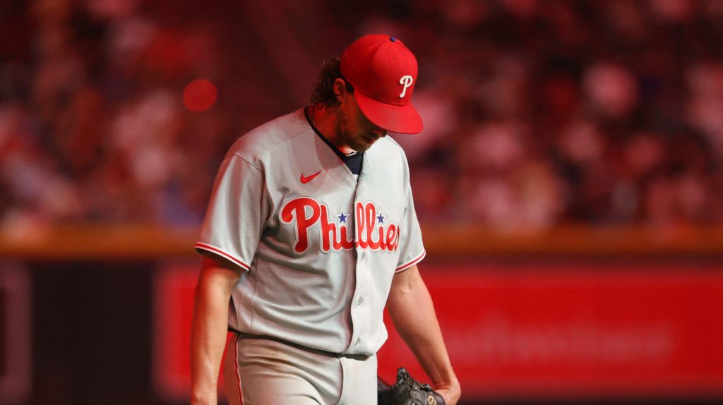 Aug 31, 2026; Phoenix, Arizona, USA; Philadelphia Phillies pitcher Aaron Nola reacts after being pulled from the game in the sixth inning against the Arizona Diamondbacks at Chase Field.