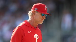 Sep 30, 2026; Cumberland, Georgia, USA; Philadelphia Phillies interim manager Don Mattingly (8) returns to the dugout after a visit to the mound in the seventh inning during game two of the Wildcard round for the 2026 MLB Playoffs at Truist Park.