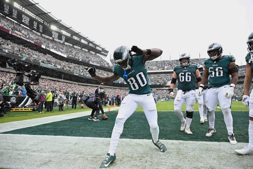 Oct 4, 2026; Philadelphia, Pennsylvania, USA; Philadelphia Eagles wide receiver Darius Cooper (80) celebrates with teammates after catching a eighteen-yard pass for a touchdown thrown by quarterback Jalen Hurts (not pictured) against the Los Angeles Rams during the second quarter at Lincoln Financial Field.