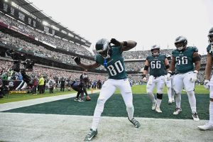 Oct 4, 2026; Philadelphia, Pennsylvania, USA; Philadelphia Eagles wide receiver Darius Cooper (80) celebrates with teammates after catching a eighteen-yard pass for a touchdown thrown by quarterback Jalen Hurts (not pictured) against the Los Angeles Rams during the second quarter at Lincoln Financial Field.