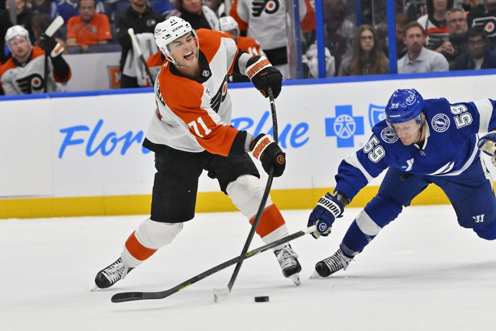 Oct 5, 2026; Tampa, Florida, USA; Philadelphia Flyers right wing Tyson Foerster (71) takes a shot during the second period against Tampa Bay Lightning center Jake Guentzel (59) at Benchmark International Arena.