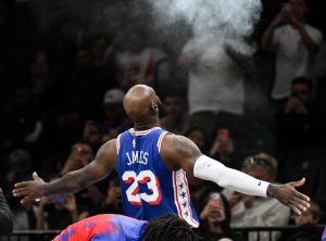 Oct 8, 2026; Brooklyn, New York, USA; Philadelphia 76ers forward Lebron James (23) tosses powder into the air before the start of the game against the Brooklyn Nets at Barclays Center.