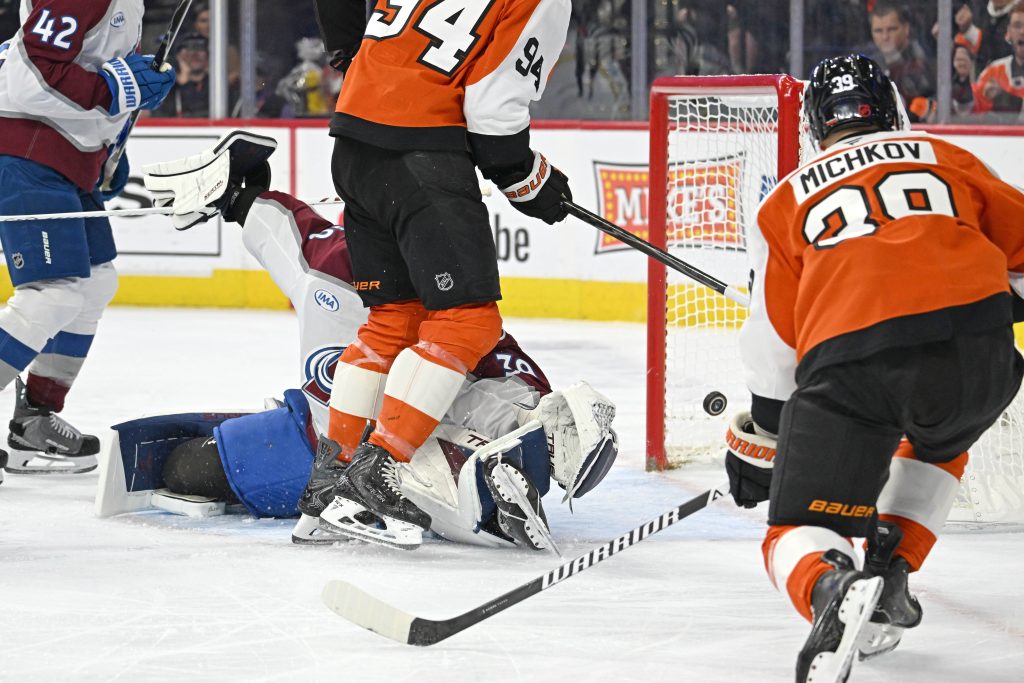 Oct 19, 2026; Philadelphia, Pennsylvania, USA; Philadelphia Flyers right wing Matvei Michkov (39) scores a goal pst Colorado Avalanche goaltender Mackenzie Blackwood (39) during the first period at Xfinity Mobile Arena. Mandatory Credit: