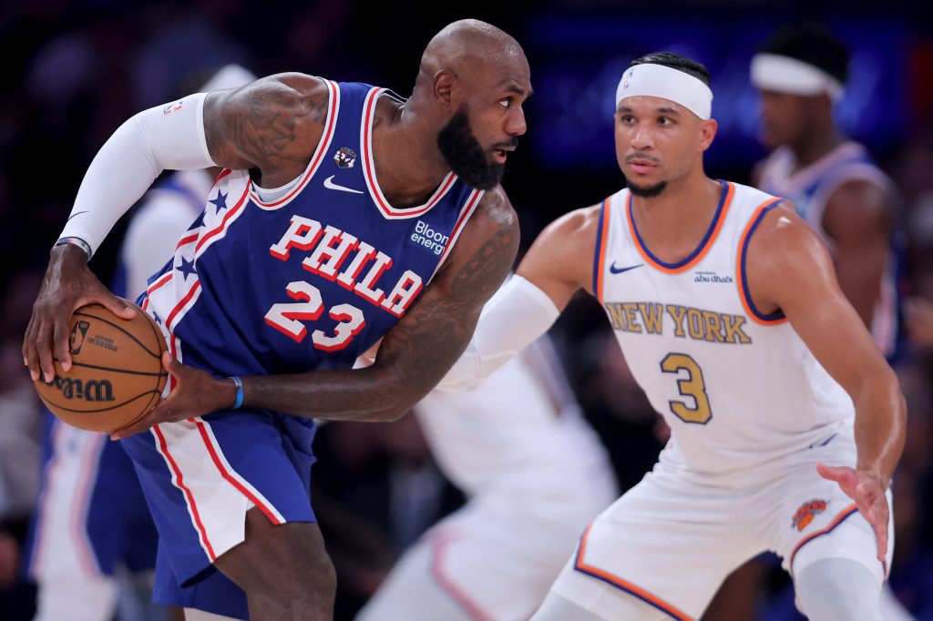 Oct 20, 2026; New York, New York, USA; Philadelphia 76ers forward LeBron James (23) controls the ball against New York Knicks guard Josh Hart (3) during the first quarter at Madison Square Garden.
