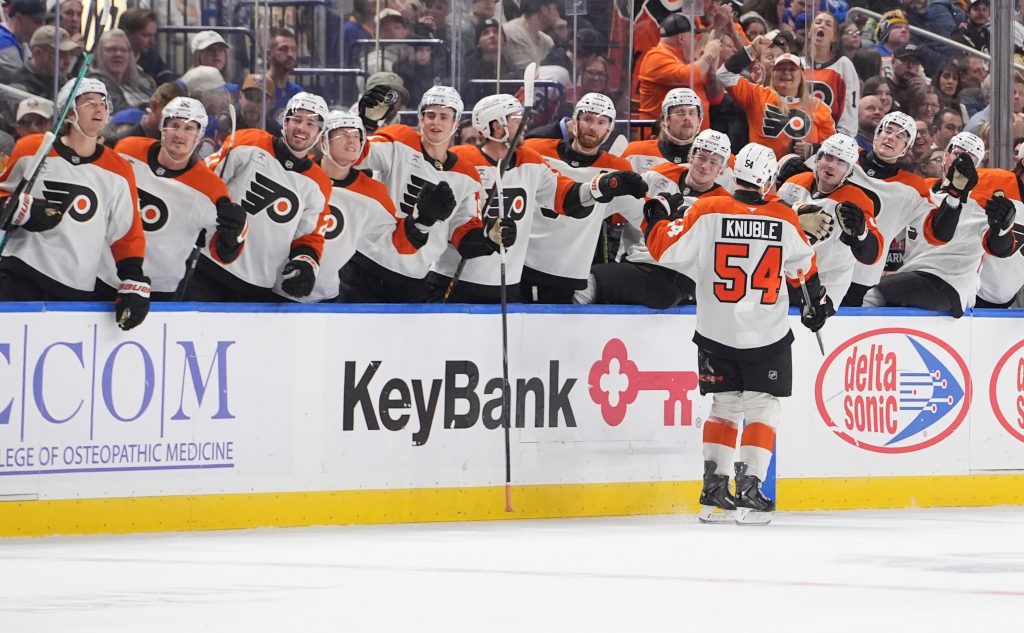 Oct 21, 2026; Buffalo, New York, USA; Philadelphia Flyers right wing Cole Knuble (54) is congratulated by teammates for scoring a goal during the first period against the Buffalo Sabres at KeyBank Center.