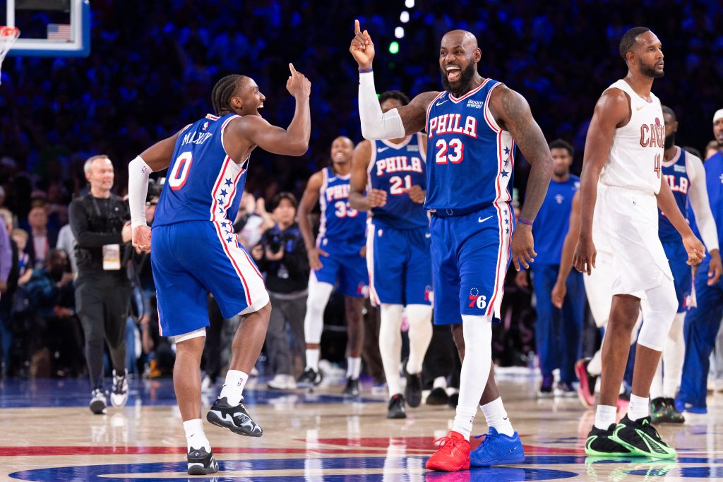 Oct 22, 2026; Philadelphia, Pennsylvania, USA; Philadelphia 76ers forward LeBron James (23) and Tyrese Maxey celebrate after a score against the Cleveland Cavaliers during the fourth quarter at Xfinity Mobile Arena. Mandatory Credit: