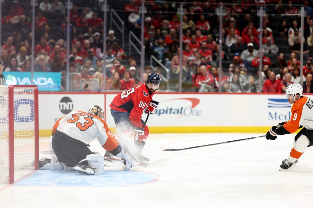 Oct 28, 2026; Washington, District of Columbia, USA; Philadelphia Flyers goaltender Joseph Woll (53) makes a save on Washington Capitals right wing Alex Tuch (89) during the third period at Capital One Arena. Mandatory Credit: