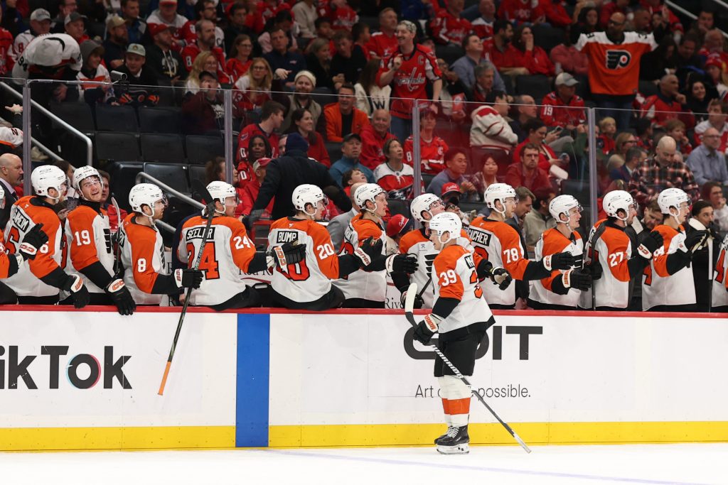 Oct 28, 2026; Washington, District of Columbia, USA; Philadelphia Flyers right wing Matvei Michkov (39) celebrates with teammates after scoring a goal against the Washington Capitals at Capital One Arena.