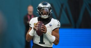Oct 11, 2026; Tottenham, ENG; Philadelphia Eagles quarterback Jalen Hurts (1) drops back to pass during the second half against the Jacksonville Jaguars at Tottenham Hotspur Stadium.