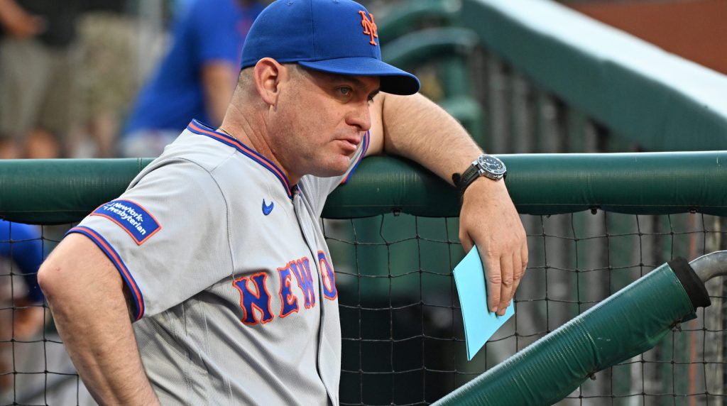 Jun 18, 2026; Philadelphia, Pennsylvania, USA; New York Mets manager Carlos Mendoza (64) in the dugout against the Philadelphia Phillies at Citizens Bank Park.