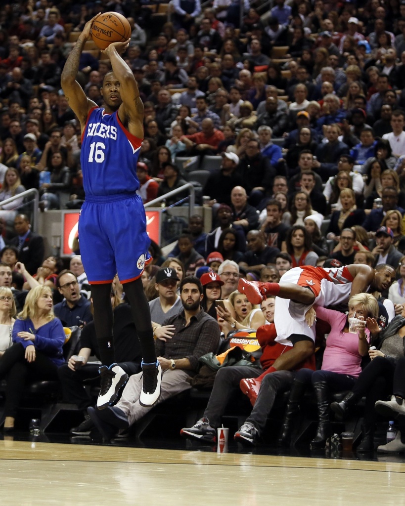 Chris Johnson shooting a three is the least interesting part of this picture. Photo Credit: John E. Sokolowski-USA TODAY Sports