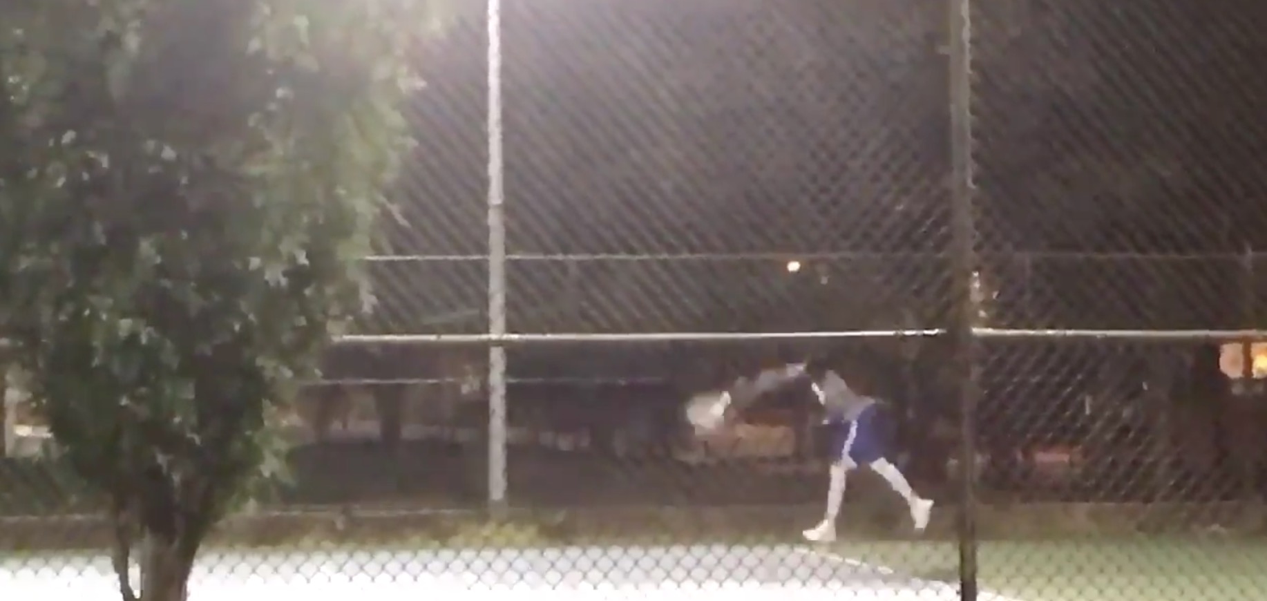 And Now We Have Video of Joel Embiid Dominating Tennis Courts at Night