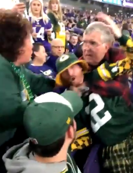 Vikings Fan Puts Young Whippersnapper in a Headlock
