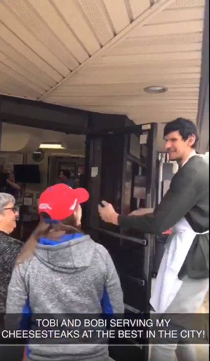 Boban and Tobi serving up cheesesteaks