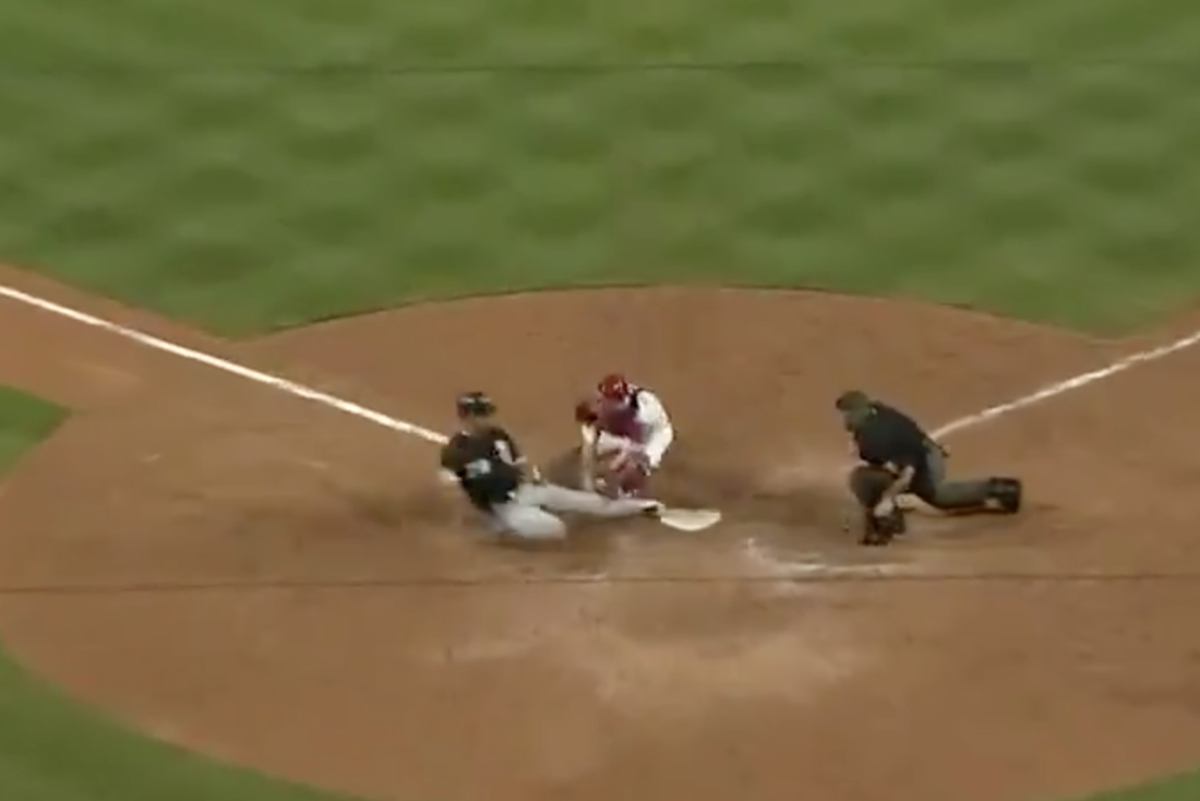Vince Velasquez, Left Fielder, Throws Out Runner at Home Crossing Broad
