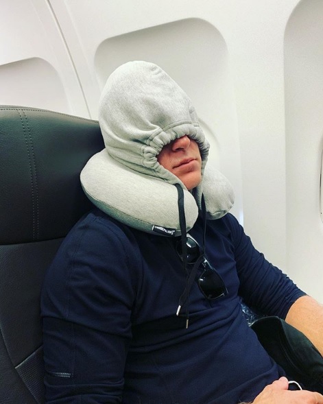Chase Utley Wearing a “Hoodie Pillow” on his Philly Flight