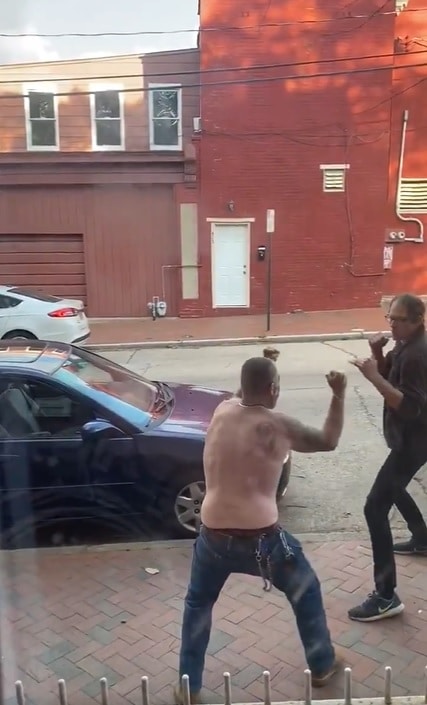 Epic Street Fight Between Bespectacled Guy and Shirtless Opponent