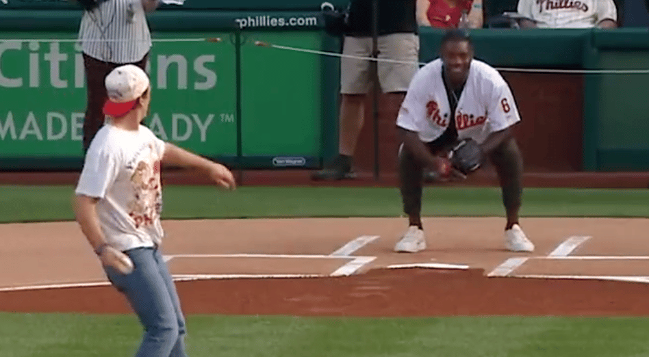 Ryan Howard’s Team Issues Statement on Dropped First Pitch From Miles Teller