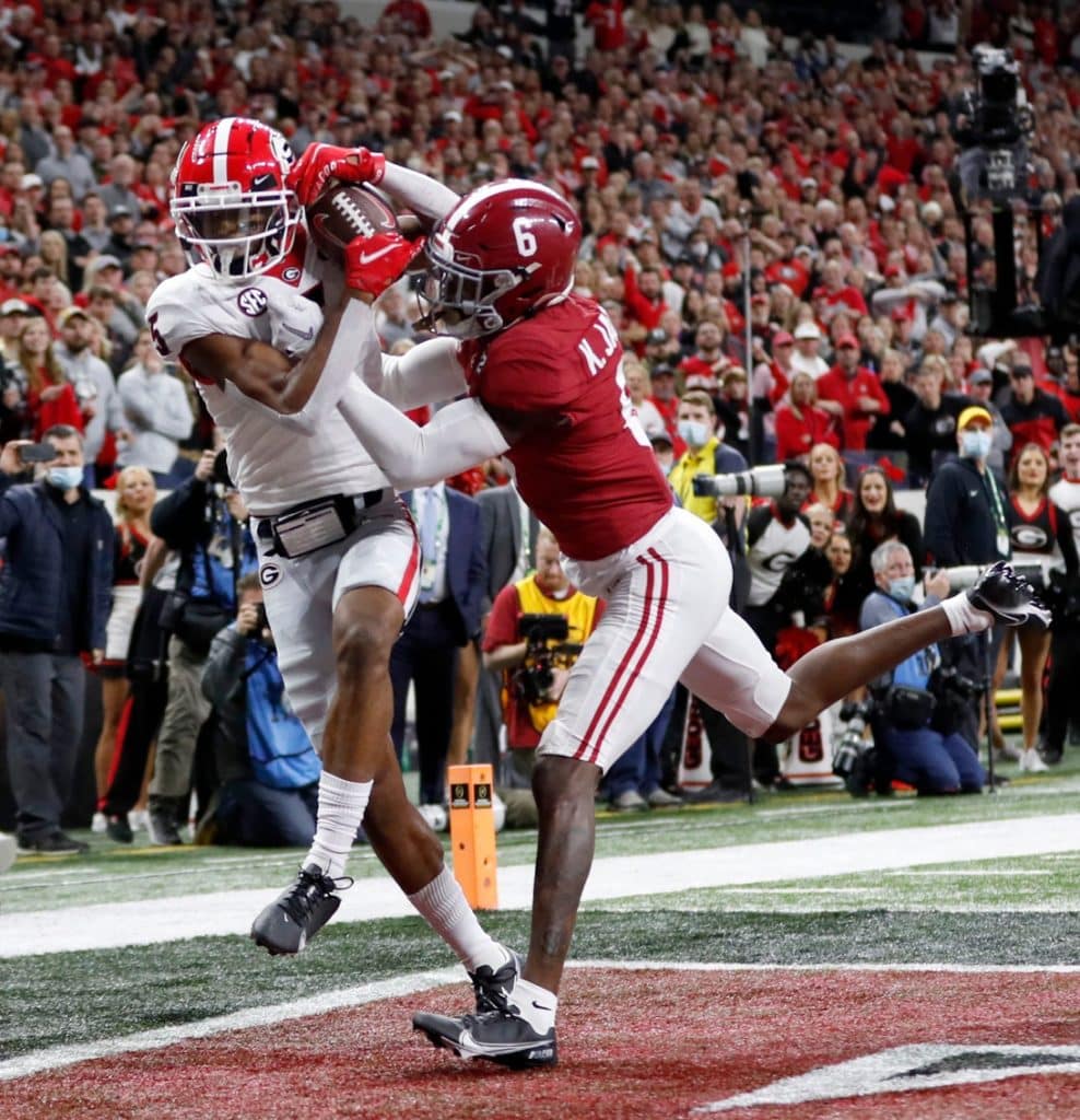 College football playoff going to 12 teams crossing broad