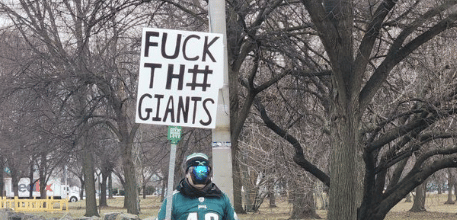 Eagles Fan Outside NovaCare with the Strangest “Fuck Th# Giants” Sign and Mask