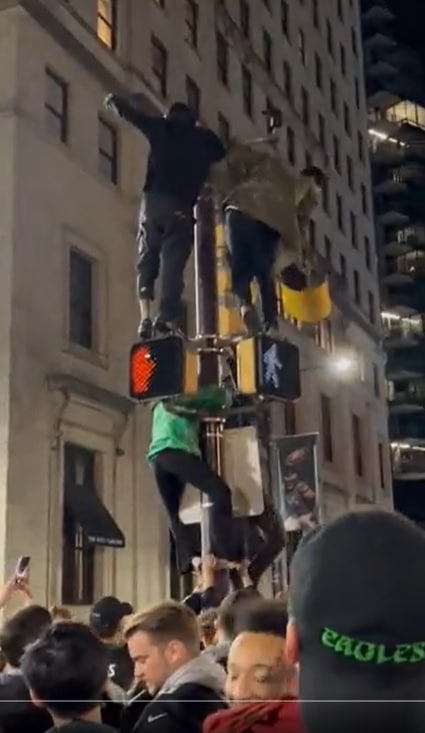 Eagles Fans Once Again Conquer Greased Poles