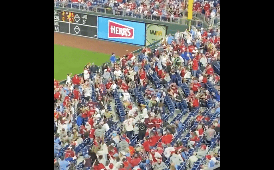 Phillies Fans Sharing Hot Dogs with Each Other is What Dollar Dog Night is All About